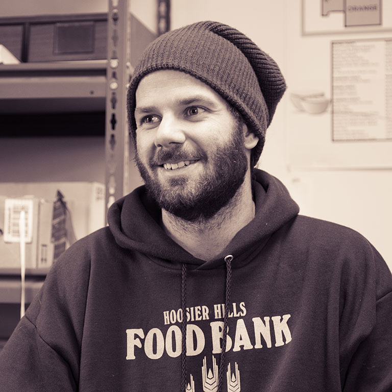 Carl Woody in a Hoosier Hills Food Bank sweatshirt.